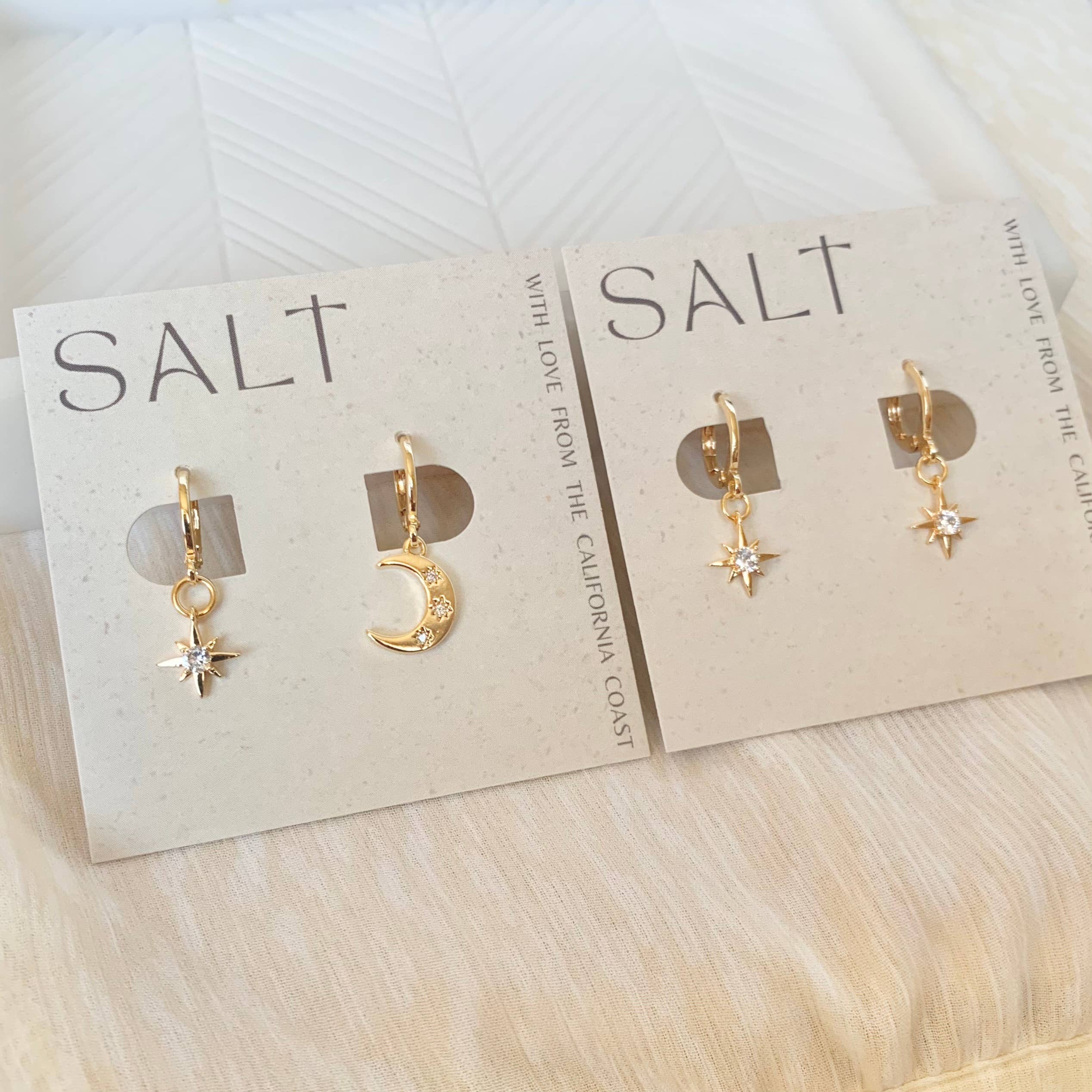 STARBURST HUGGIE HOOPS | gold | star charm earrings